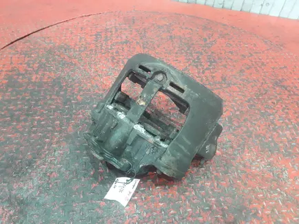 21487612 VOLVO Суппорт задний правый