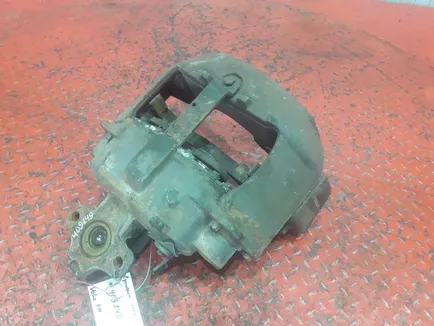 20527569 VOLVO Суппорт передний правый, Отсутствует