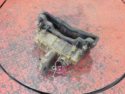 20527036 VOLVO Суппорт передний левый