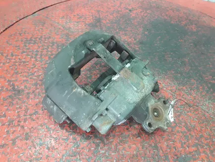21487605 VOLVO Суппорт передний правый