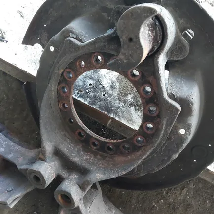 5010260113 RENAULT Пыльник тормозного барабана, Отсутствует