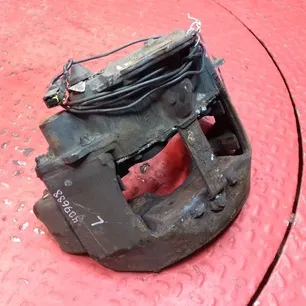 21487595 VOLVO Суппорт задний левый