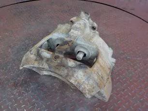 20424074 VOLVO Суппорт задний левый