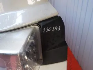 82446592 VOLVO Заглушка решетки левая