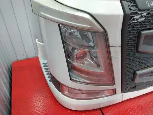 21874457 VOLVO Рамка фары правая